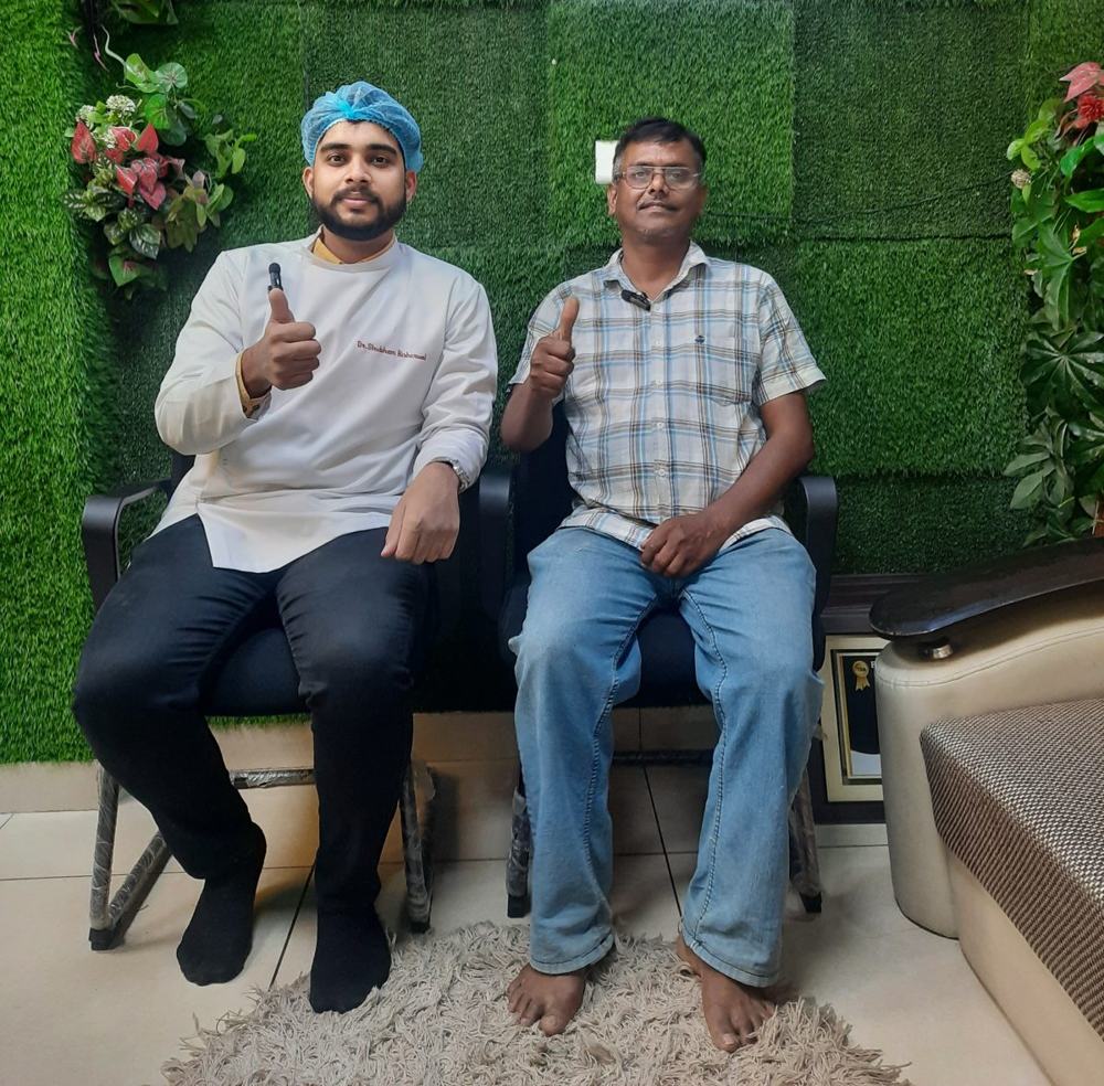 Dr Shubham Bisherwal with a happy patient at Vital Dental Care