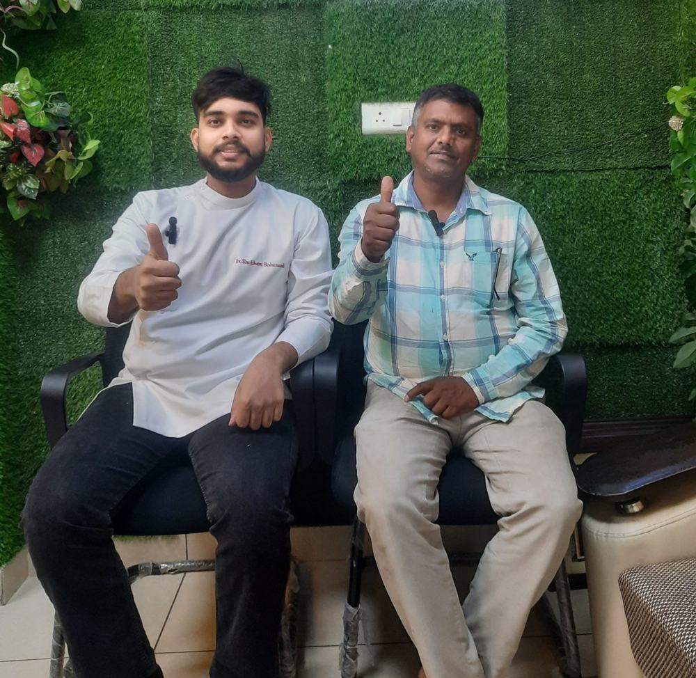 Dr Shubham Bisherwal with a happy patient at Vital Dental Care